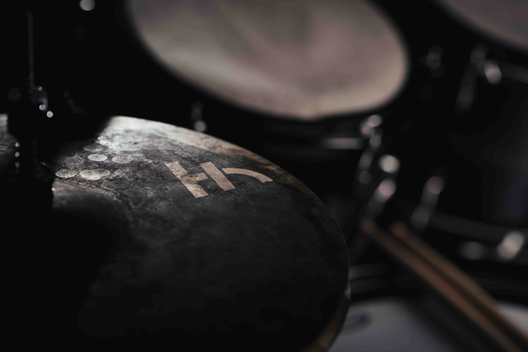 Drum kit with HEPHOS cymbals in a studio setting